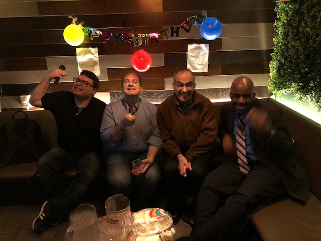 Four Job Path participants having a fun time at a birthday party.