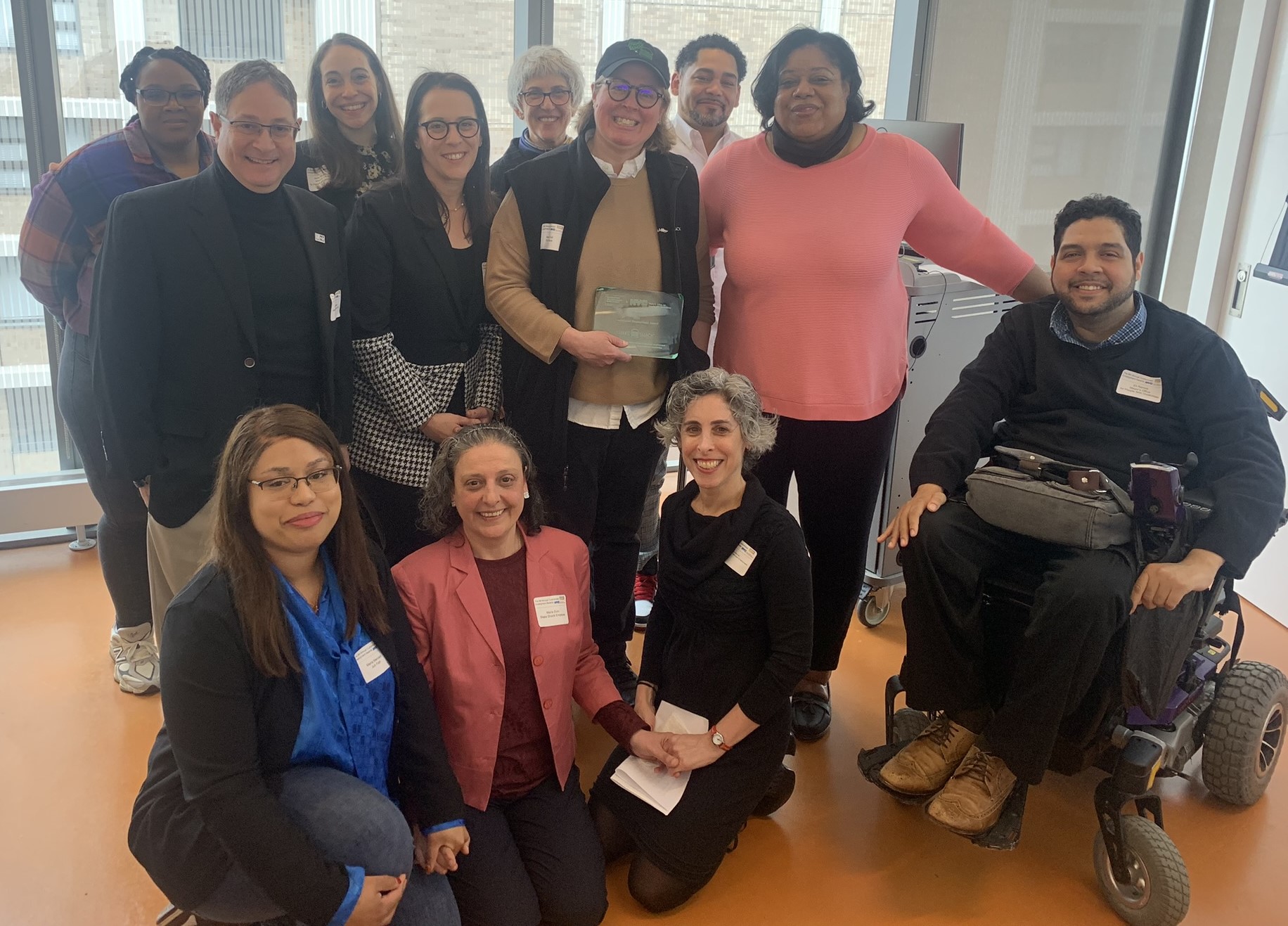 People who attended the CCE Awards in March 2024 in a group photo, including the honoree from Shake Shack.